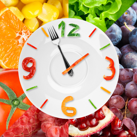 44704936 - food clock with vegetables and fruits as background. healthy food concept